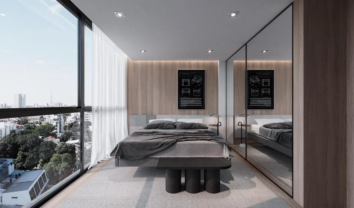 Dormitorio con ventanal de piso a techo y vista urbana