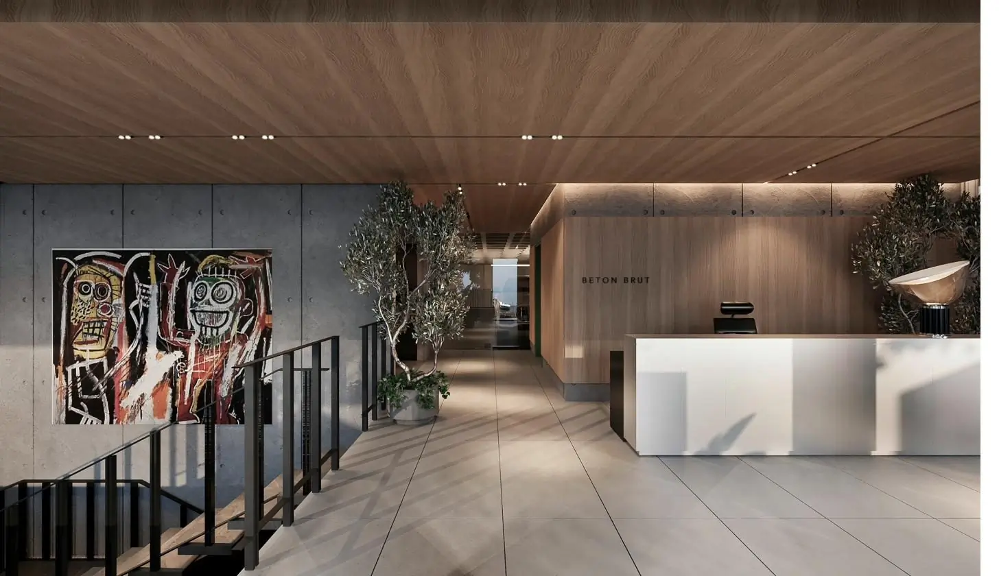 Lobby en doble altura de Béton Brut